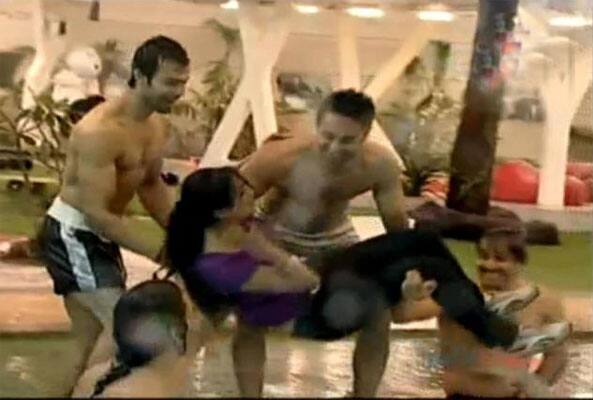 Shweta Tiwari is thrown in to the swimming poll of the house by flirtatious male members.