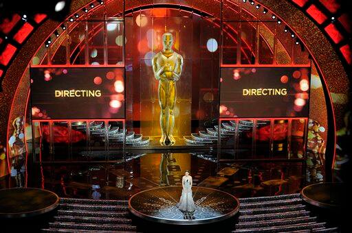 Actress Hilary Swank introduces director Kathryn Bigelow during the 83rd Academy Awards on Sunday, Feb. 27, 2011, in the Hollywood section of Los Angeles.