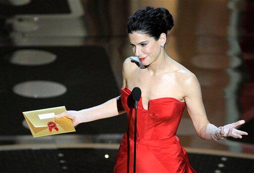 Actress Annette Bening announces the winners of the governor's award package during the 83rd Academy Awards.