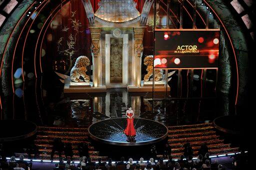 Actress Annette Bening announces the winners of the governor's award package during the 83rd Academy Awards.