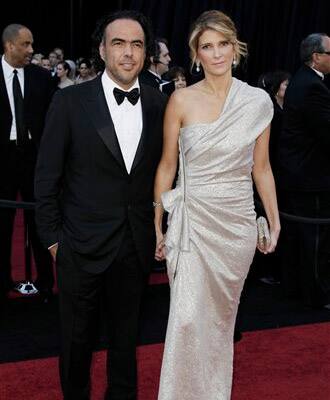 Director Alejandro Gonzalez Inarritu, left, and his wife Maria Hagerman Gonzales arrive before the 83rd Academy Awards.