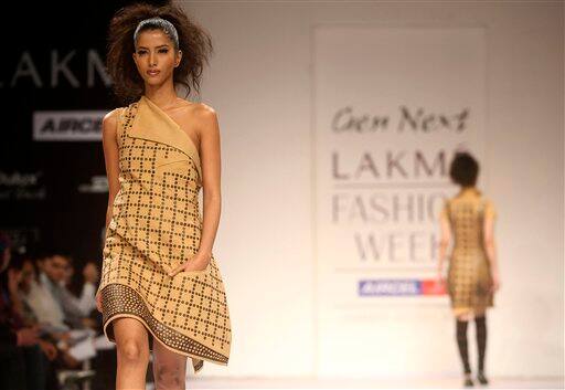 Models display creations by designer Shivaji Dutta during the Lakme Fashion Week.