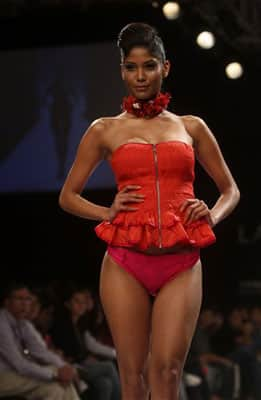 A model displays a creation by designer Chaitanya Rao during the Lakme Fashion Week.