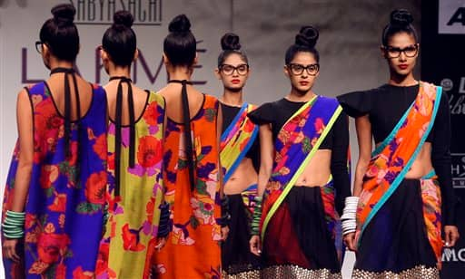 Indian models display designer Sabyasachi Mukherjee creations during the Lakme Fashion Week .