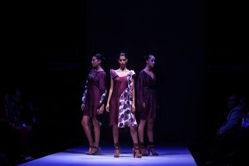 Models display Japanese designer Araisara's creations during the Lakme Fashion Week.