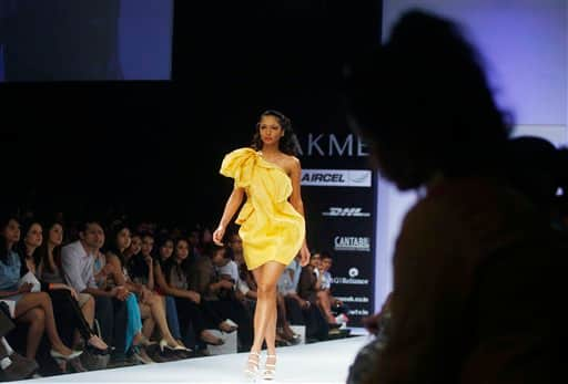 An Indian model displays designer Jatin Varma's creations during the Lakme Fashion Week .