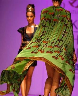 Indian models display creations by designer Pria Kataaria Puri during the Lakme Fashion Week.