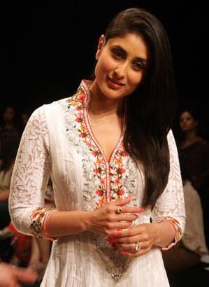 Bollywood actress Kareena Kapoor attends Indian designer Manish Malhotra's show on the second day of 2011 Lakme Fashion Week.