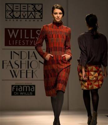 Models display creations by Indian designer Neeru Kumar during Wills Lifestyle India Fashion Week in New Delhi.