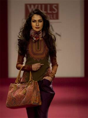 A model displays a creation by Indian designer Ritu Kumar during Wills Life Style India Fashion week, in New Delhi.