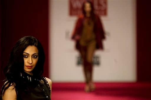 Models display creations by Indian designer Ritu Kumar during the Wills Lifestyle India Fashion week, in New Delhi.