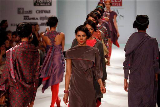 Models display creations by Indian designer Jasona Anshu during the Wills Lifestyle India Fashion Week, in New Delhi.