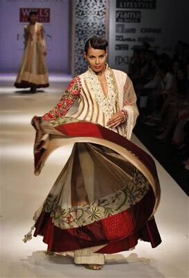 Indian models display designer Manish Malhotra's creations during the Wills Lifestyle India Fashion Week, in New Delhi.