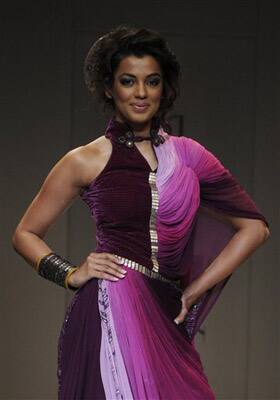 Mugdha Godse displays creations by Indian designer Pallavi Jaipur during the Wills Lifestyle India Fashion Week, in New Delhi.