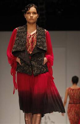 A model displays a creation by Indian designer Anand Bhushan during the Wills Lifestyle India Fashion Week, in New Delhi.