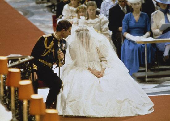 Lady Diana looks like a fairy in her white wedding gown.