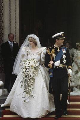 The Royal couple walks down the stairs after the wedding.