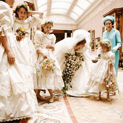 Bride Diana shares a moment with her maids as Queen Mother Elizabeth looks on.