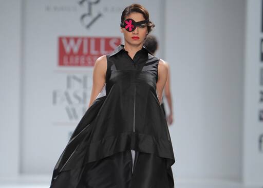 Black dominated Rahul Reddy’s collection ornated delicately with bright pink and tonal greys.