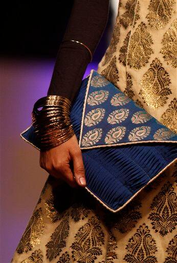 A model presents a creation by Anita Dogre at the India Fashion Week in New Delhi.