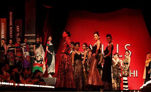 Models present a creation by Sabyasachi Mukherjee at the India Fashion Week in New Delhi.