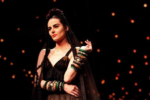 A model presents a creation by Sabyasachi Mukherjee at the India Fashion Week in New Delhi.