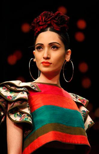 A model presents a creation by Sabyasachi Mukherjee at the India Fashion Week in New Delhi.