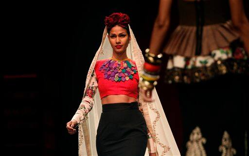 A model presents a creation by Sabyasachi Mukherjee at the India Fashion Week in New Delhi.