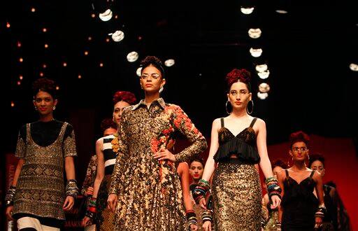 Models present a creation by Sabyasachi Mukherjee at the India Fashion Week in New Delhi.