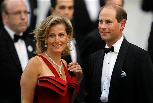 Britain's Prince Edward, Earl of Wessex, right and his wife, Sophie, Countess of Wessex arrive at a central London hotel for a pre-royal wedding dinner hosted by Lady Elizabeth Anson and attended by members of the British royal family and foreign royal families, in London.