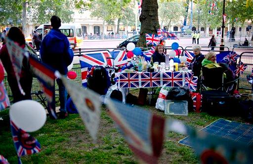 Royal enthusiasts from Sussex camp at the junction of the Mall and Horse Guards Road for the Royal Wedding in London.