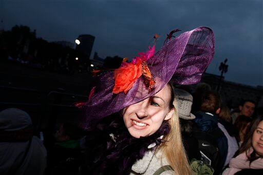 Christine Peckham from London wears a fancy hat along the Royal Wedding route in London.