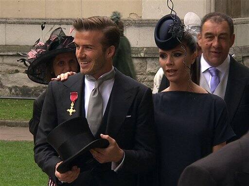 England's soccer star David Beckham and his wife Victoria arrive at Westminster Abbey for the Royal Wedding in London.