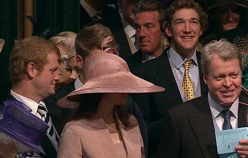 Charles Spencer, 9th Earl of Spencer, brother of the late Princess Diana, right, arrives at Westminster Abbey for the Royal Wedding in London.