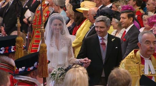 Kate Middleton walks down the aisle with her father, Michael Middleton, at Westminster Abbey for the Royal Wedding.