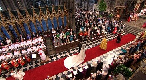 Kate Middleton walks down the aisle with her father, Michael Middleton, at Westminster Abbey for the Royal Wedding.