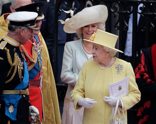 Britain's Queen Elizabeth II chats with Camilla, Duchess of Cornwall, Britain's Prince Philip and Britain's Prince Charles.