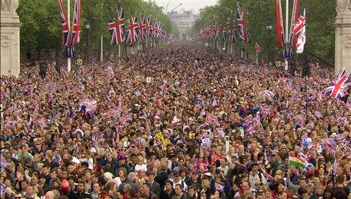 The crowd moves down the Mall, toward Buckingham Palace, druring the Royal Wedding in London.