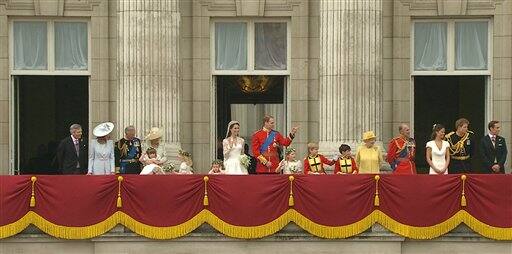 Britain's Prince William, stands on the balcony of Buckingham Palace with his wife, Kate, the Dutchess of Cambridge, and other royals after the Royal Wedding.