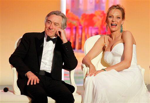 Jury member Uma Thurman, right, and president of the jury Robert De Niro attend the opening ceremony for the 64th international film festival, in Cannes.