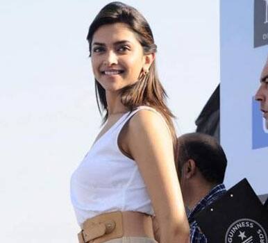 Deepika Padukone looks stunning at Neutogena largest Umbrella Mosaice press conference.