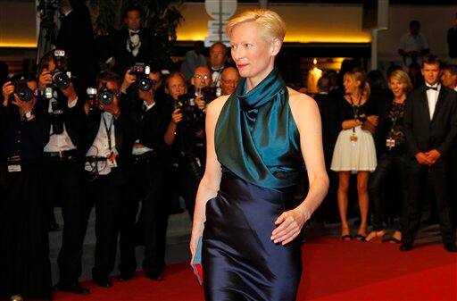 Actress Tilda Swinton poses on the red carpet as she arrives for the screening of We Need to Talk About Kevin at the 64th international film festival, in Cannes.