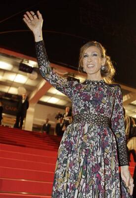 Actress Sarah Jessica Parker waves as she arrives for the screening of Wu Xia, at the 64th international film festival, in Cannes.