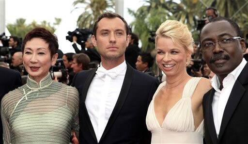 Jury members Nansun Shi, Jude Law, Linn Ullmann and Mahamat Saleh Haroun arrive for the screening of Pirates of the Caribbean: On Stranger Tides, at the 64th international film festival, in Cannes.