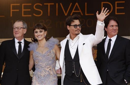 Actors Geoffrey Rush, Penelope Cruz, Johnny Depp and director Rob Marshall pose on the red carpet for the screening of Pirates of the Caribbean: On Stranger Tides, at the 64th international film festival, in Cannes.