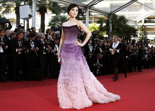 Actress Fan Bing Bing poses on the red carpet for the screening of The Artist at the 64th international film festival, in Cannes.