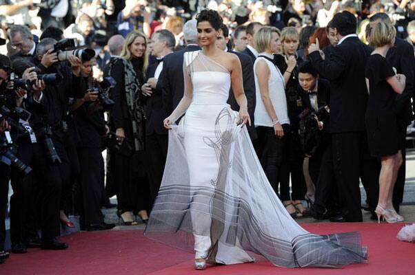 Indian actress Sonam Kapoor poses on the red carpet before the screening of 'The Artist' presented in competition at the 64th Cannes Film Festival.