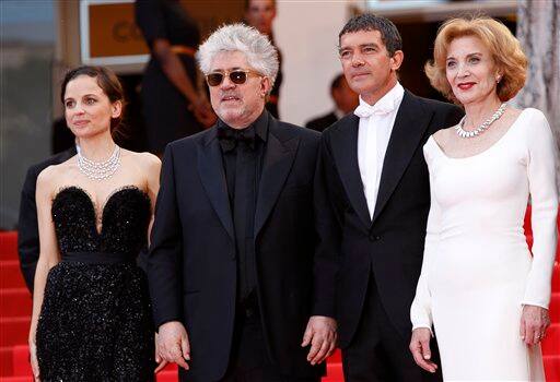 Director Pedro Almodovar, second from left, arrives with actors, from left, Elena Anaya, Antonio Banderas and Marisa Paredes for the screening of The Skin I Live In, at the 64th international film festival, in Cannes.