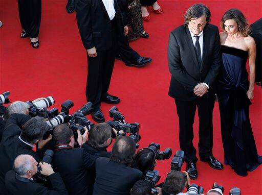 Director Emir Kusturica, left, and actress Elodie Bouchez arrive for the screening of The Source, at the 64th international film festival, in Cannes.