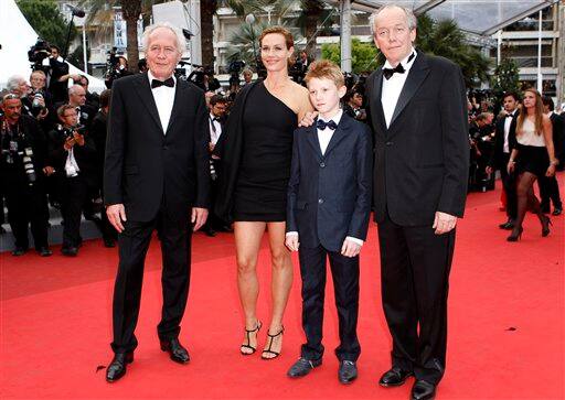 From left, director Jean-Pierre Dardenne, actors Thomas Doret, Cecile de France and director Luc Dardenne arrive for the closing ceremony at the 64th international film festival, in Cannes.